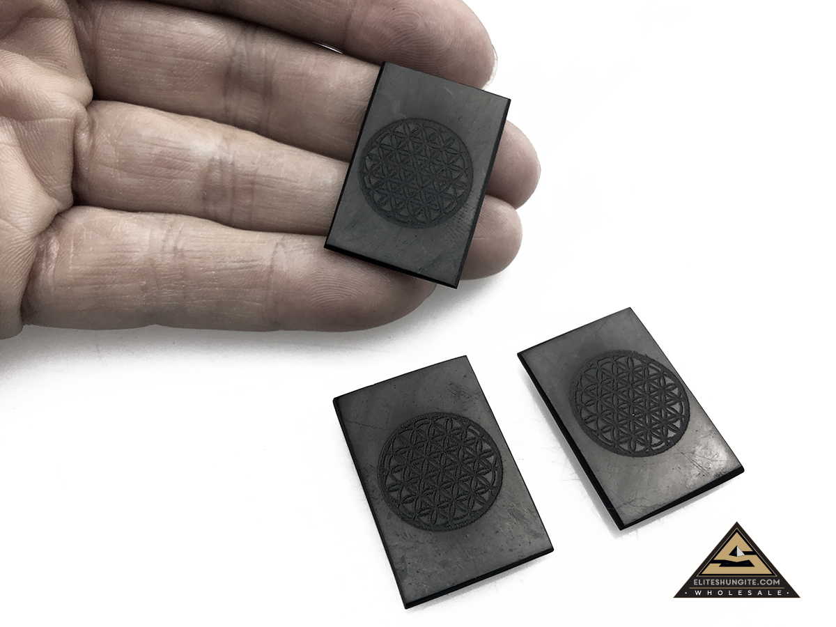 Protective slice for notebook rectangular 2 x 3 cm, carving Flower of Life by eliteshungite.com