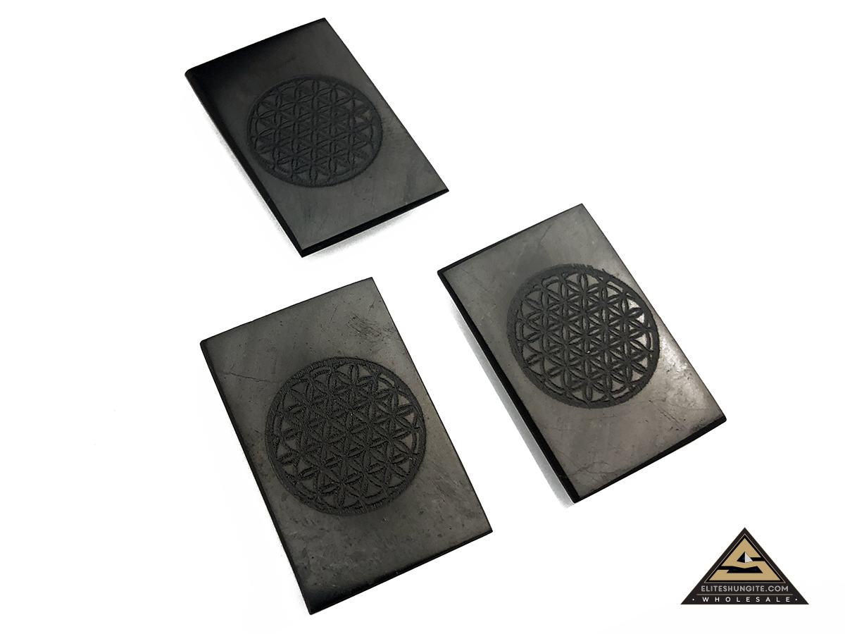 Protective slice for notebook rectangular 2 x 3 cm, carving Flower of Life by eliteshungite.com